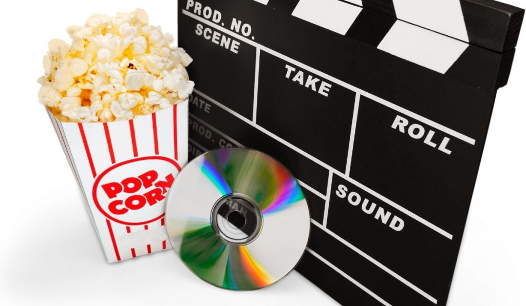 clapper, popcorn and cd