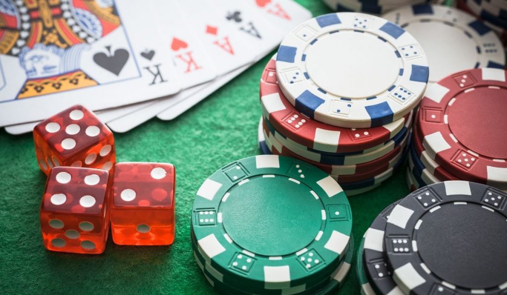 casino chips, dice and cards